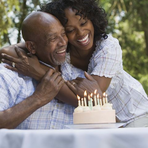 father and daughter with birthday cake