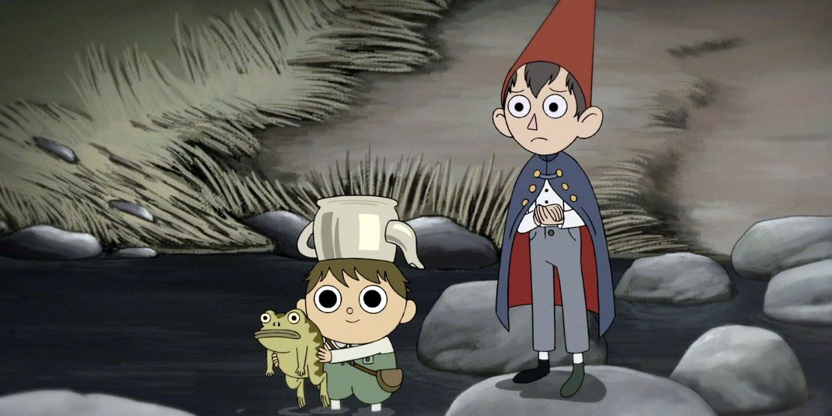 Little boy Greg with a teapot on his head, holds a green frog.  Wirt, worried and his hands crossed, stands behind him.  They both stand on rocks, crossing a river.